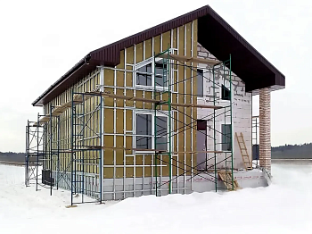 Утепление фасада и монтаж облицовки зимой